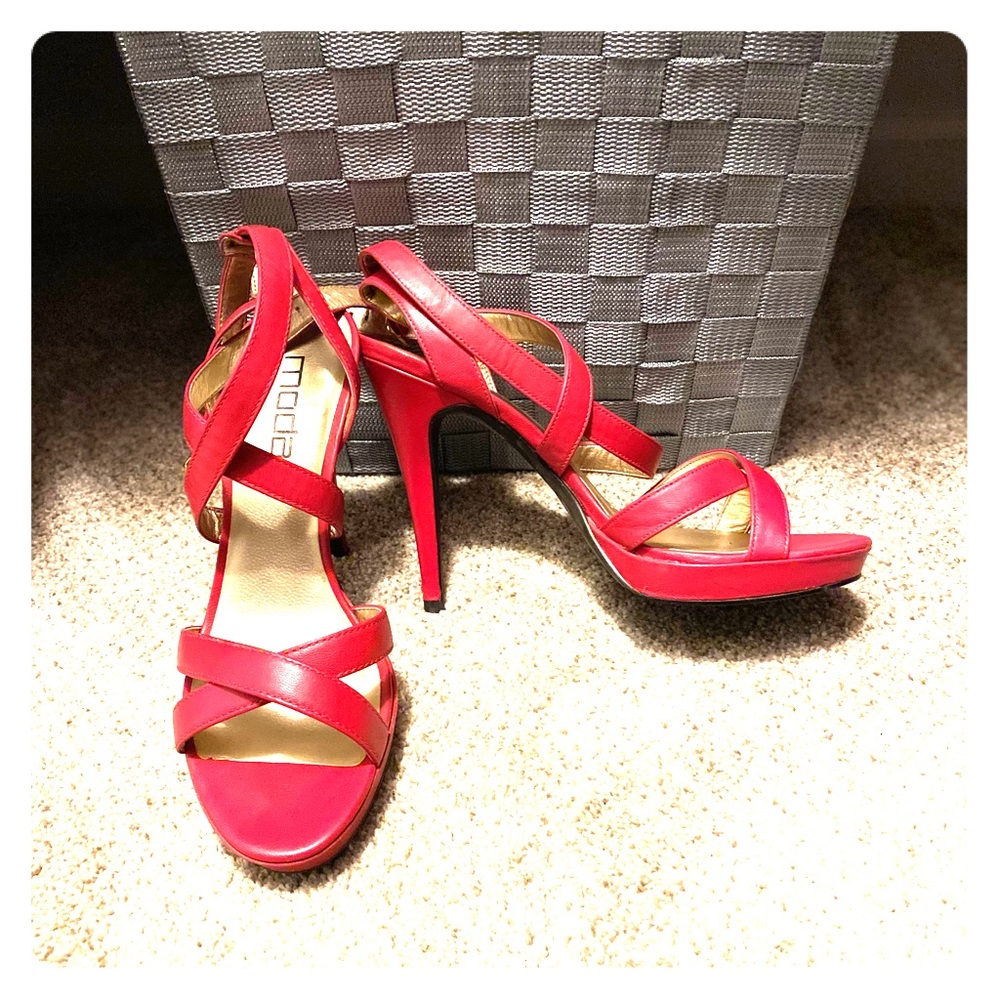 4 inch strappy hot pink heels.